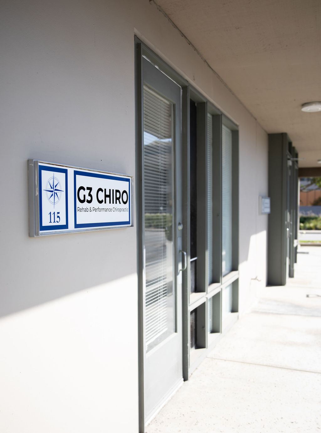 The G3 Chiro suite sign and entrance doors at 4121 Westerly Pl, Suite 115, Newport Beach